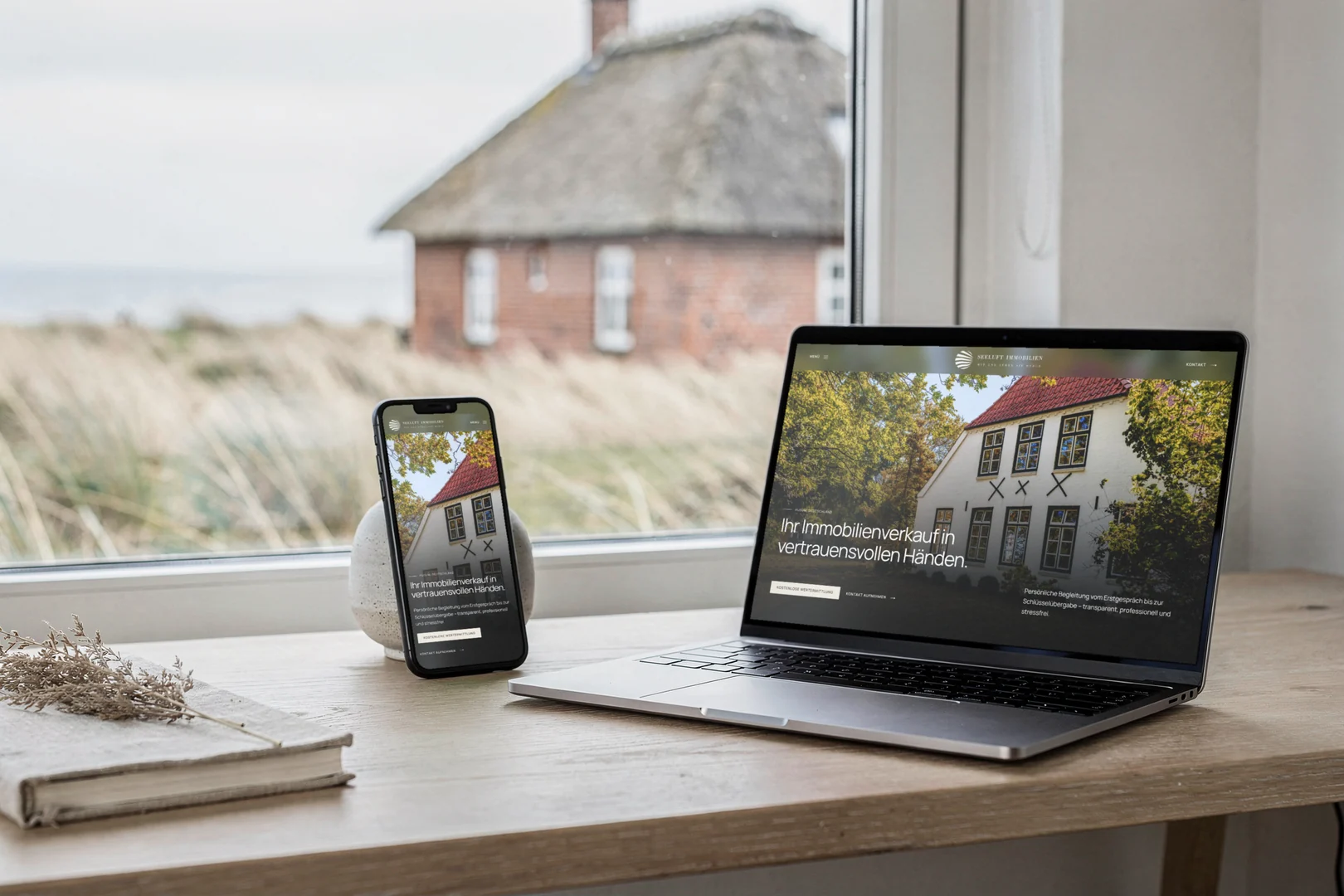Die neue Seite von Seeluft Immobilien am Rechner und am Handy